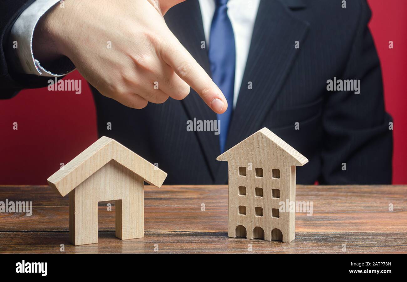 A man prefers to choose a apartment residential building rather than an