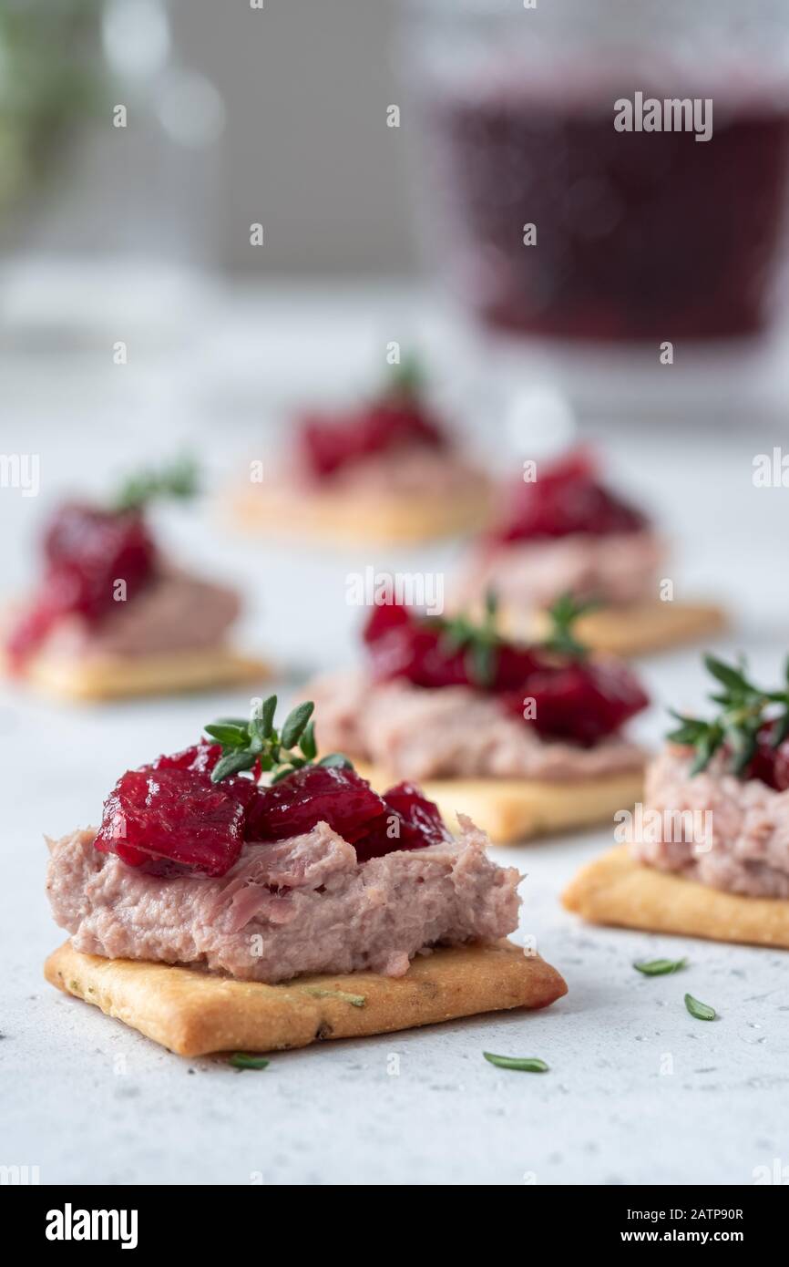 Rosemary Cracker with pate and cranberry sauce Stock Photo Alamy
