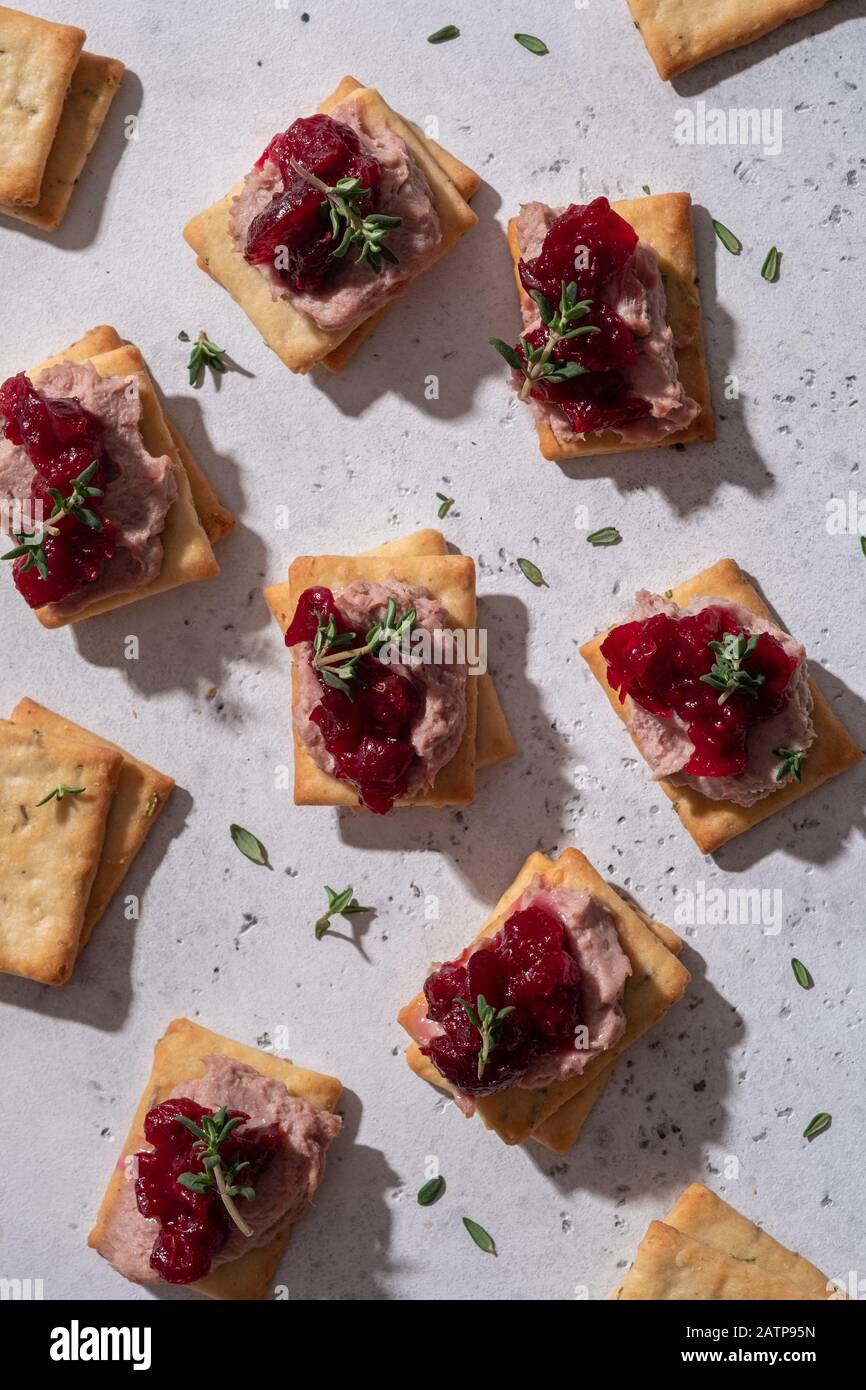Rosemary Cracker with pate and cranberry sauce Stock Photo Alamy