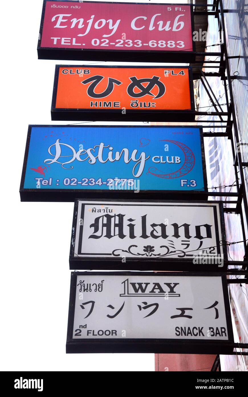Signs advertise night clubs on Soi Thaniya, one of the famous nightlife