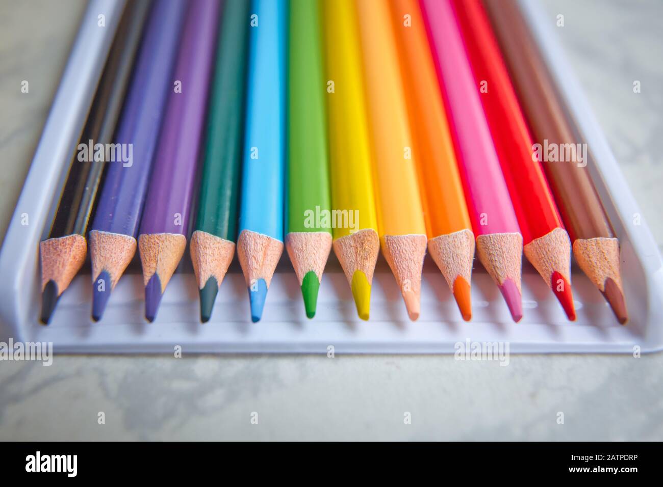 Close up. seamless colored pencils row with wave on lower side . Set of ...