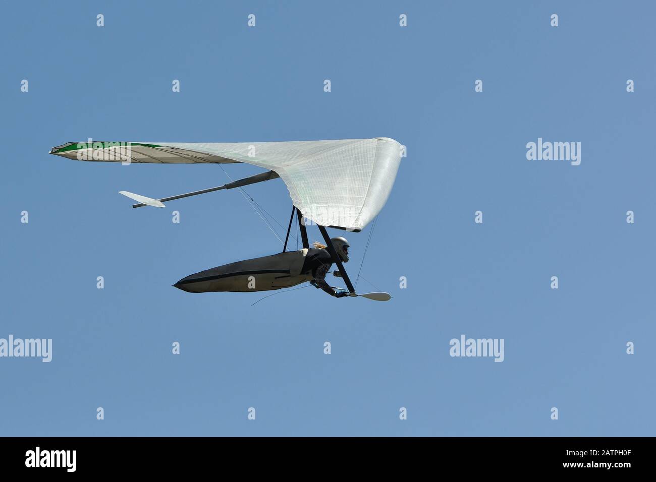 Hang glider pilot silhouette. Extreme airborne sports Stock Photo