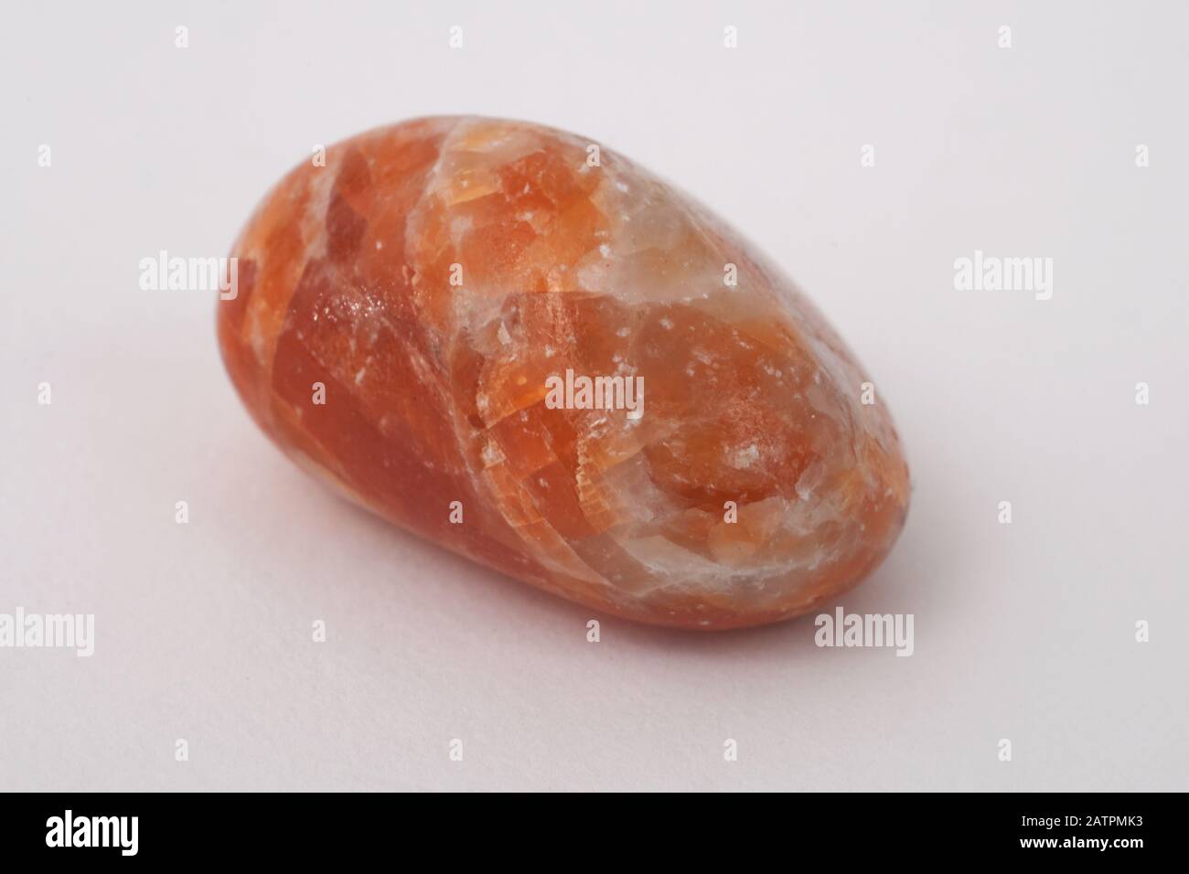 An orange calcite Gemstone Stock Photo