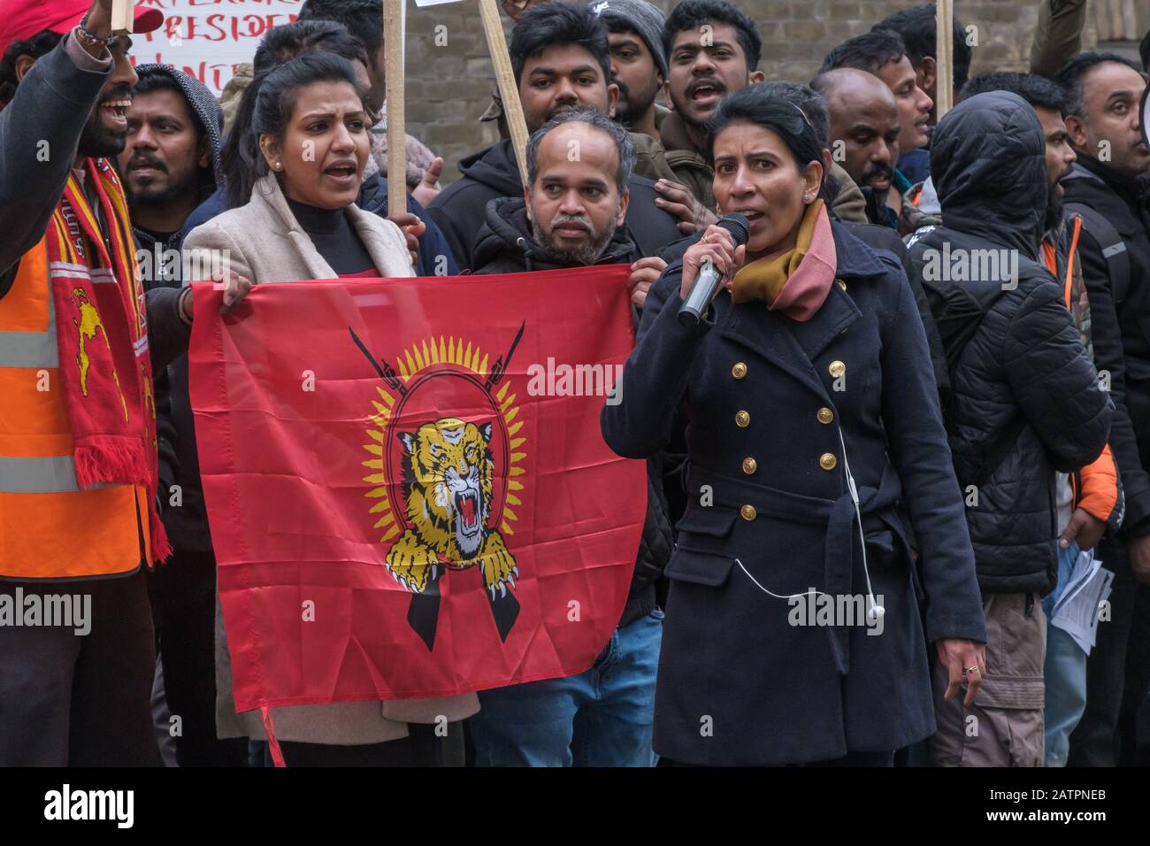 London, UK. 4th February 2020. people hold Tamil Eelam flag. Tamils protest at the Sri Lankan High Commission on Independence Day against the continued denial of the democratic and national rights of Tamils. Sri Lanka now admits the 20,000 Tamils 'disappeared' by the authorities in 2009 are dead and Tamils demand justice and information about their deaths. Credit: Peter Marshall/Alamy Live News Stock Photo