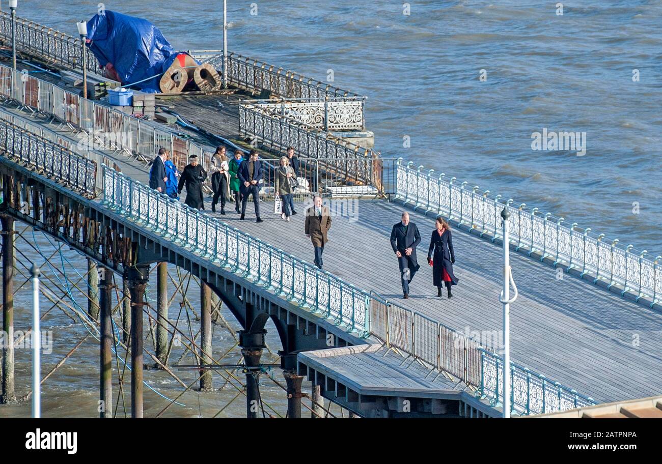 Mumbles Pier - Swansea - Wales - UK - 4th February 2020 Prince William, Duke of Cambridge and Catherine, Duchess of Cambridge walk back along Mumbles Pier after a visit to the RNLI Lifeboat Station in Mumbles near Swansea today.  Pic by Lisa Dawson Rees Credit: Phil Rees/Alamy Live News Stock Photo
