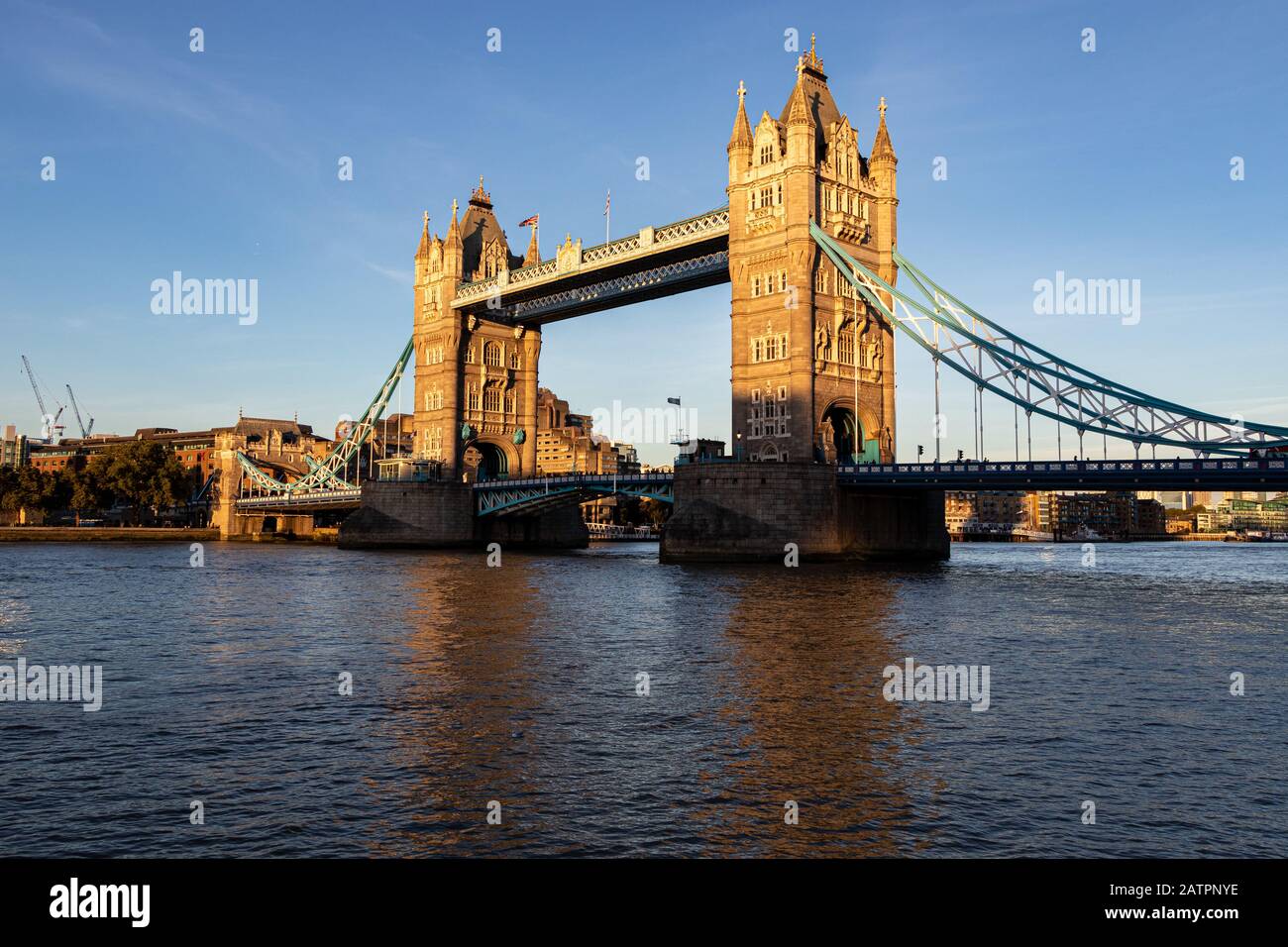 beautiful picture of the Tower Bridge in London during sunset. The Bridge is half in the shade and half in the sun, London, UK. Stock Photo