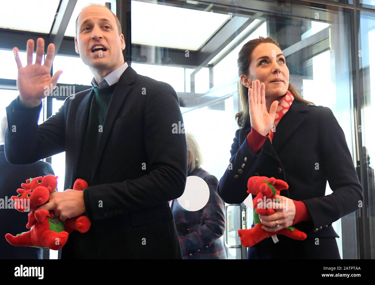 The Duke and Duchess of Cambridge, holding dragon toys they received for their children, during a visit to Tata Steel in Port Talbot in south Wales. Stock Photo