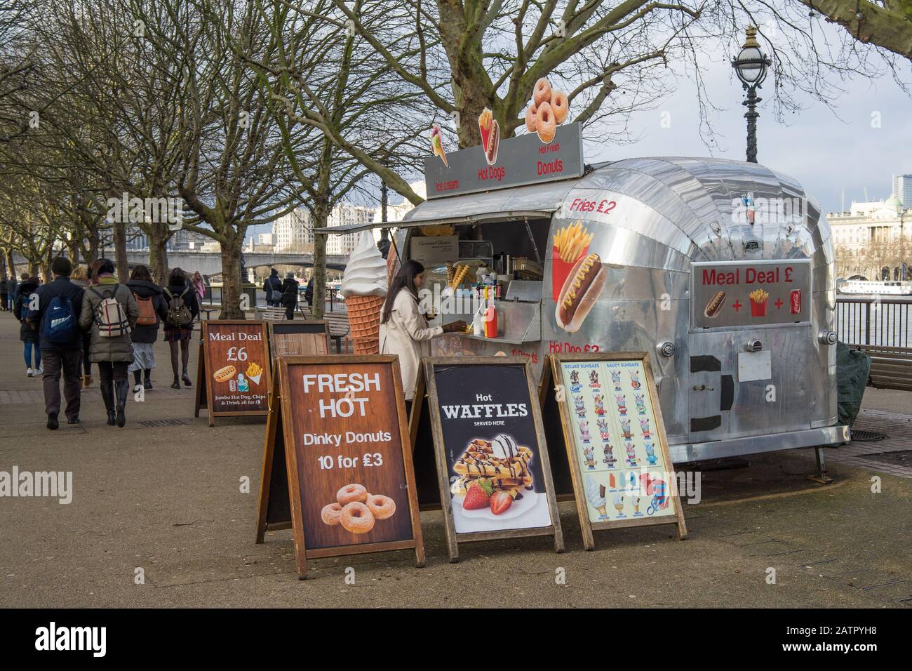 Mobile hot dog and doughnut truck on the Southbank of the River Thames in London Stock Photo
