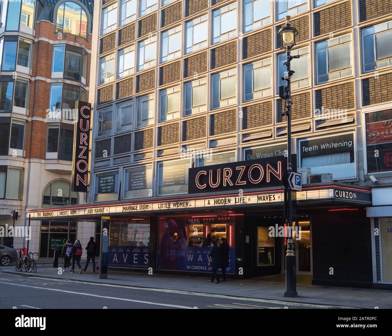 Curzon cinema on Shaftesbury Avenue in London in the afternoon sunlight ...