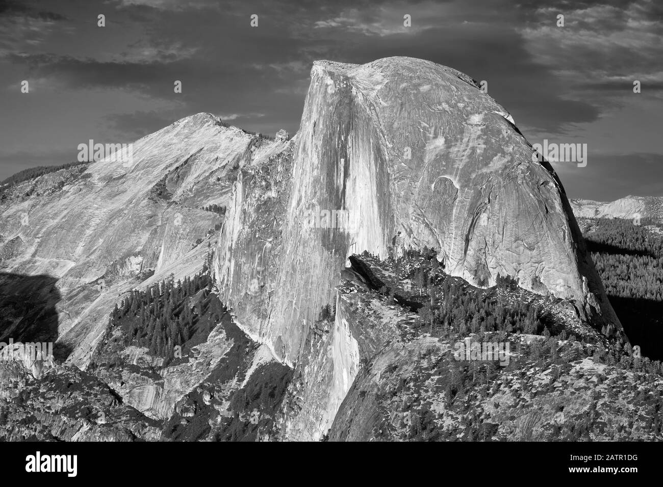 Black and white picture of Half Dome, famous granite dome of Yosemite Valley, California, USA. Stock Photo