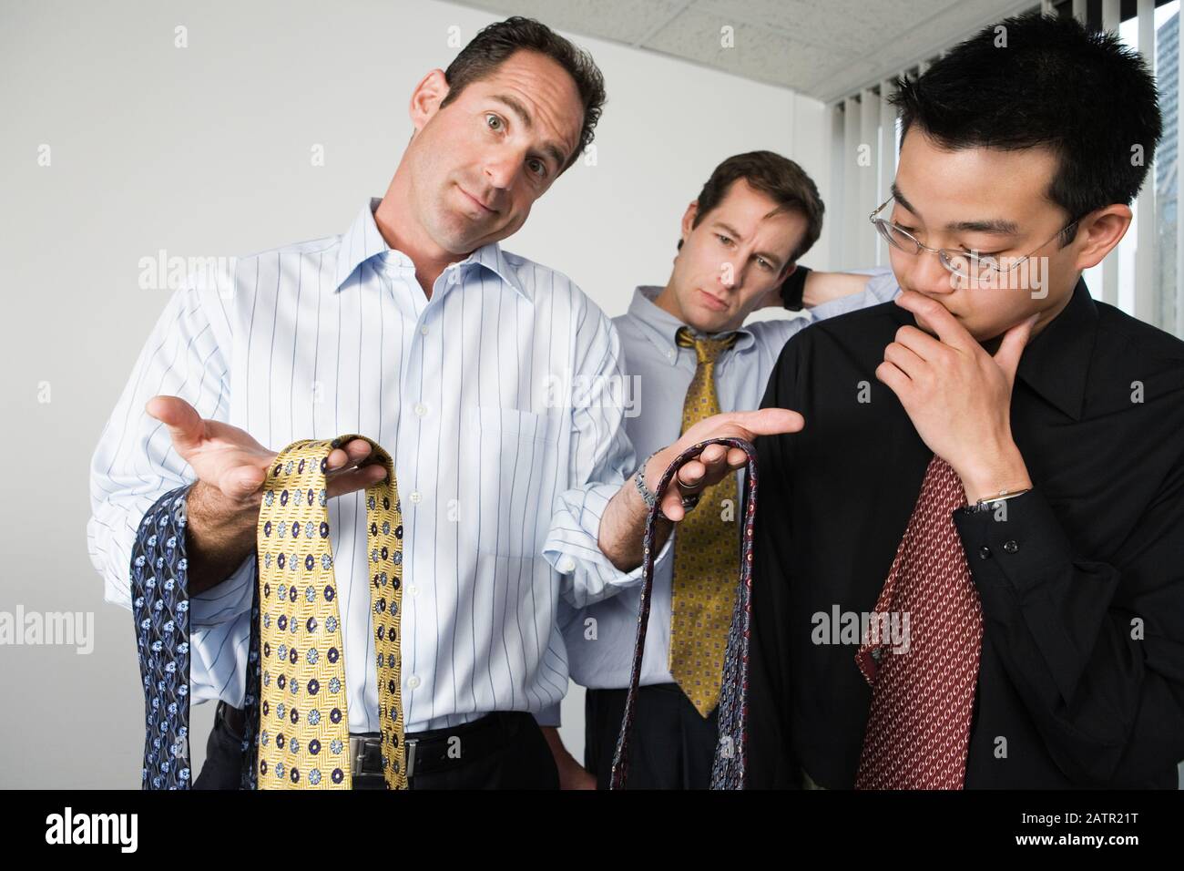 View of businessmen looking at neckties. Stock Photo