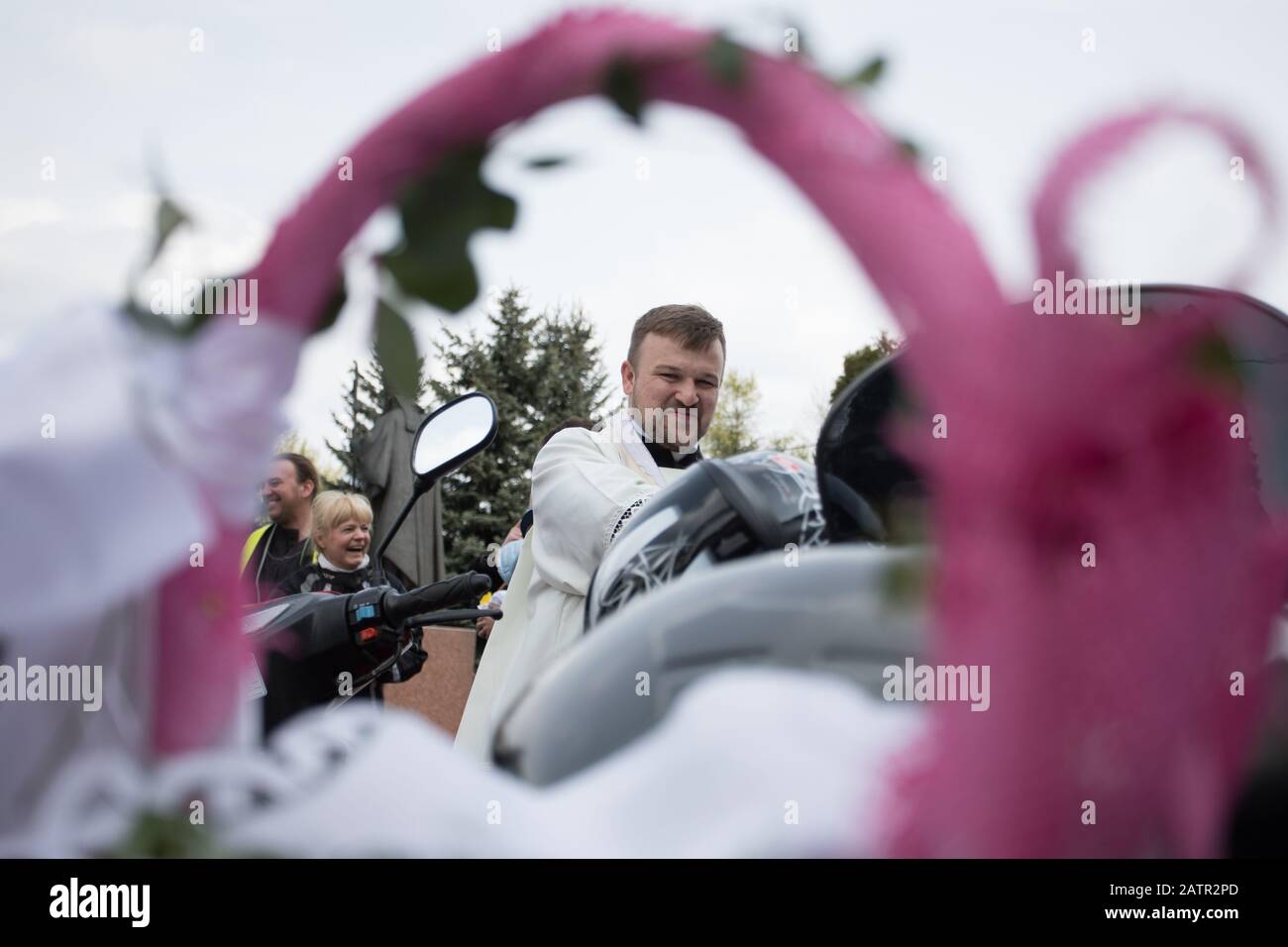 POLAND -15 April 2017:  effectuation of Easter basket and motorcycles in Holy Saturday (Easter Eve), food traditionally blessed before Easter Stock Photo