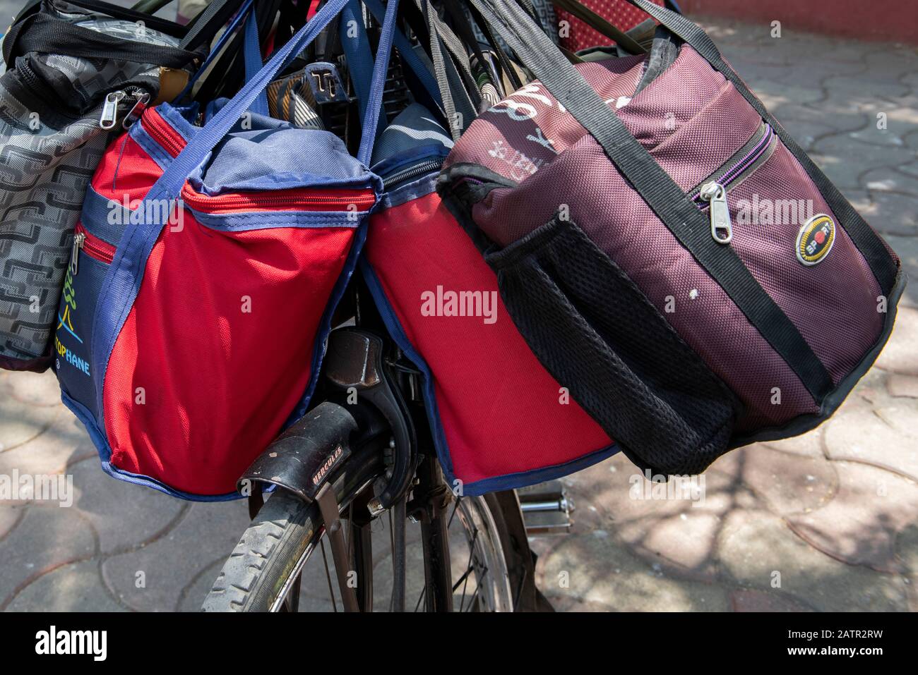 India, Mumbai aka Bombay. Dabbawalas (aka dabbawallas or dabbawallahs, tiffin wallahs) deliver lunches all over the city every day. Detail of lunches. Stock Photo