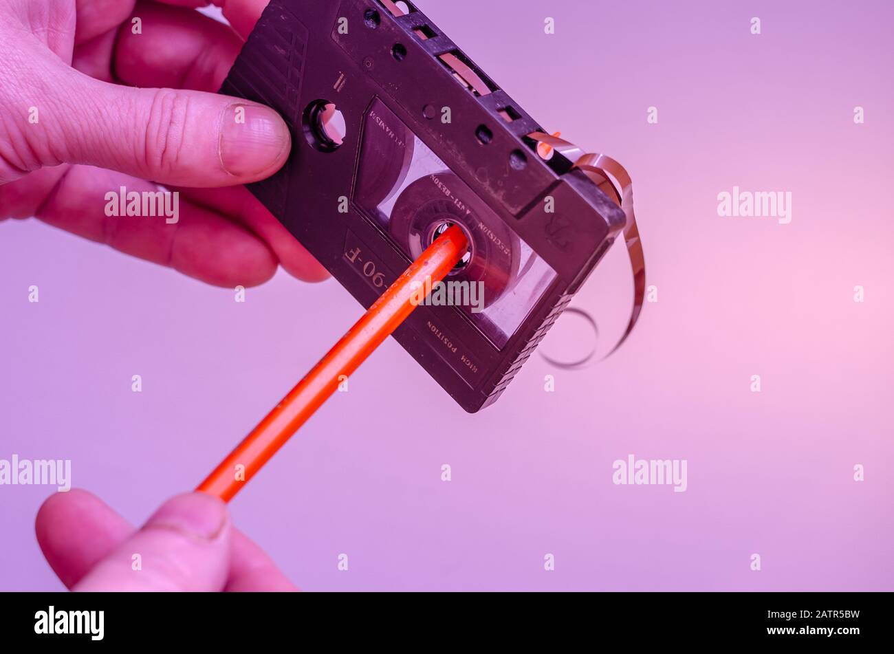 Manual rewinding of tape. Pleasant memories. View from above