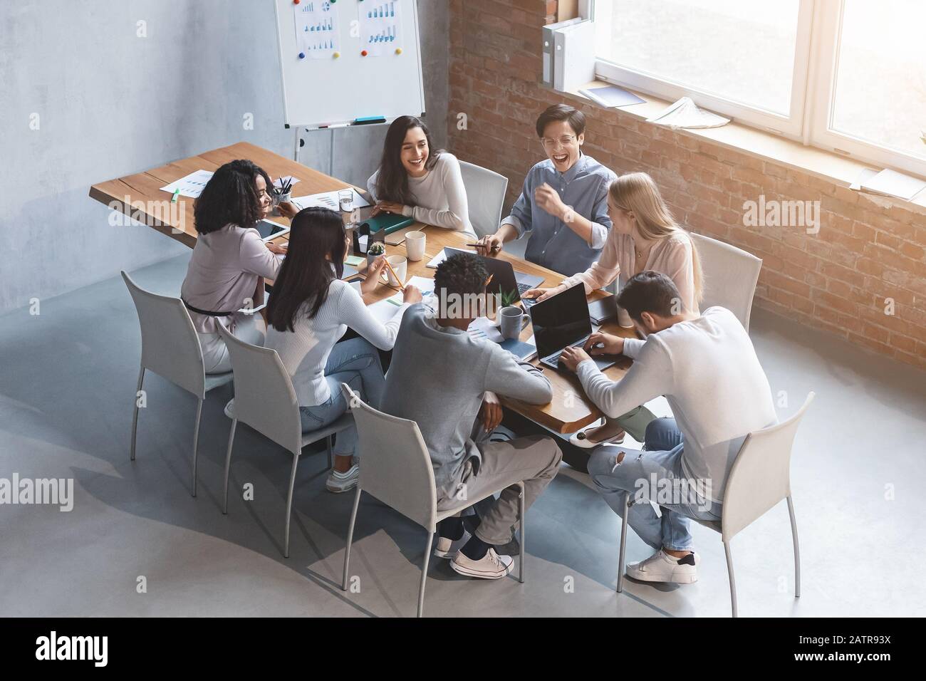 Creative business team discussing new project in office Stock Photo