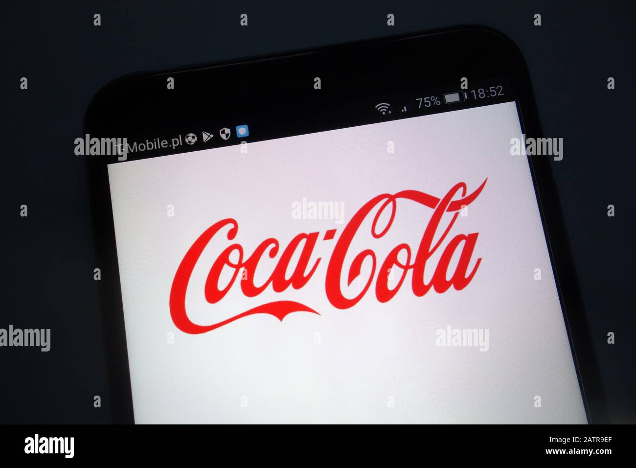 Coca-Cola logo on smartphone Stock Photo