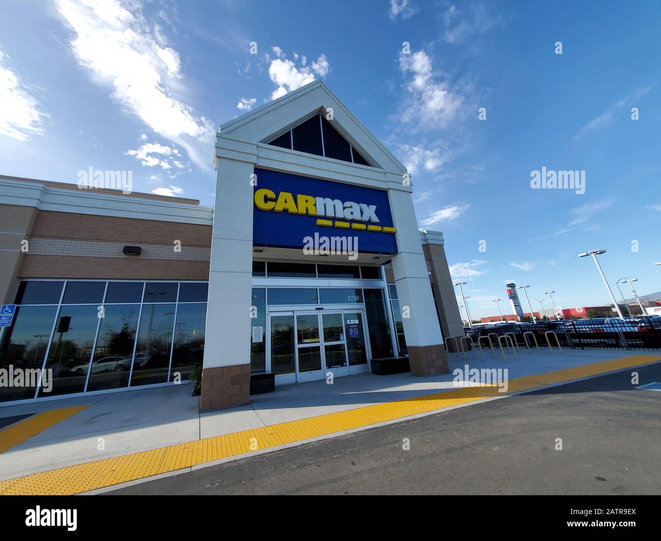 Facade of Carmax used car sales company store in Pleasanton, California, wide angle, January 31, 2020. () Stock Photo