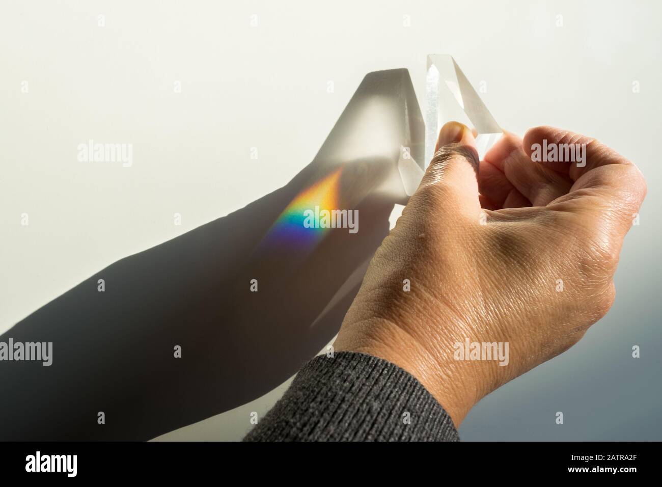 Demonstration of breaking and dispersion of light in a prism. Physics