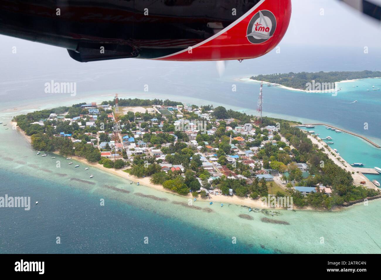 Madives aerial - the island of Rasdhoo, seen from a Trans Maldivian Airways seaplane, Rasdhoo atoll, the  Maldives, Asia Stock Photo