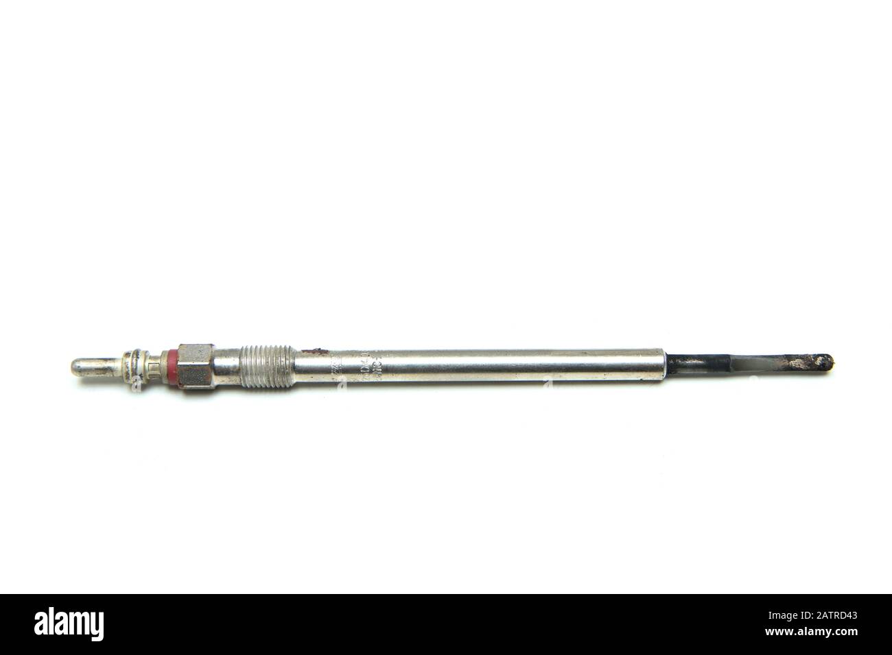 The used glow plug for diesel engines isolated on a white background. Stock Photo