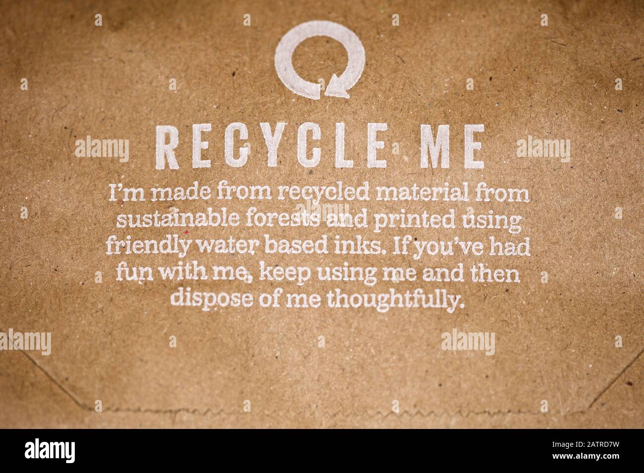 Recycle me message on a brown paper bag Stock Photo - Alamy