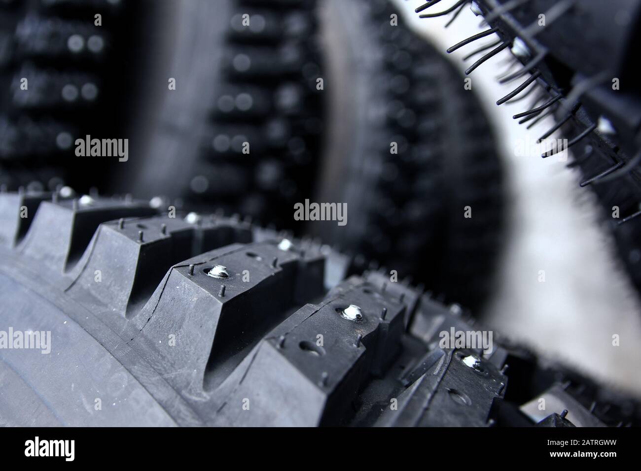 A detail of the tyre with studs used for the rally cars to have a better control on snow and ice. Stock Photo