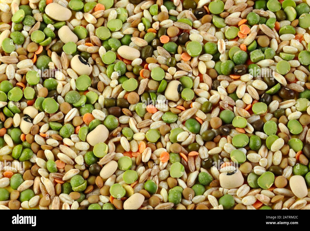 Food background of mixed dried legumes and cereals. Stock Photo