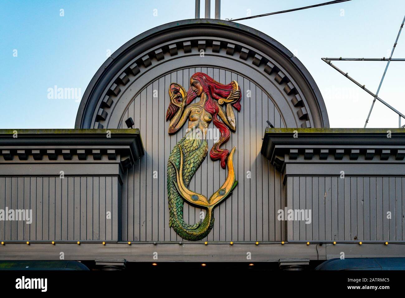 Carved wooden Mermaid Olive and Anchor Restaurant, Horseshoe Bay, West