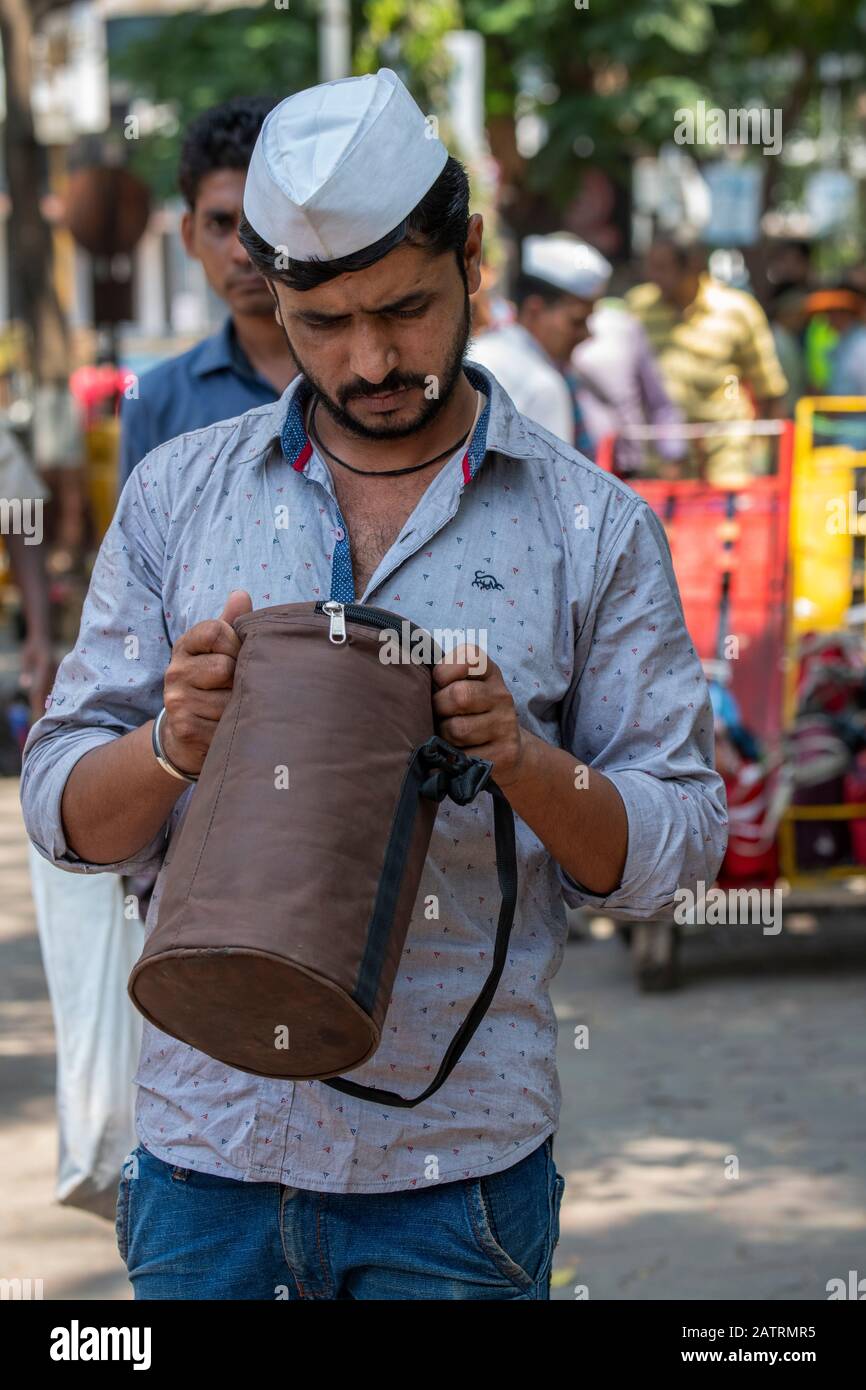 India, state of Maharashtra, capital city of Mumbai aka Bombay. Dabbawalas (aka dabbawallas or dabbawallahs, tiffin wallahs) deliver lunches all over Stock Photo