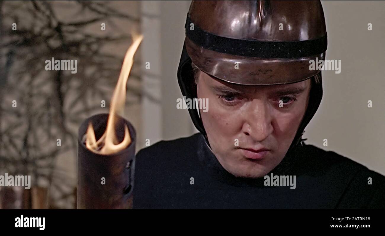 Fahrenheit 451 (1966) directed by François Truffaut and starring Oskar Werner as Guy Montag, a disillusioned fireman in Ray Bradbury’s dystopian world where books are outlawed and burnt by firemen. Stock Photo