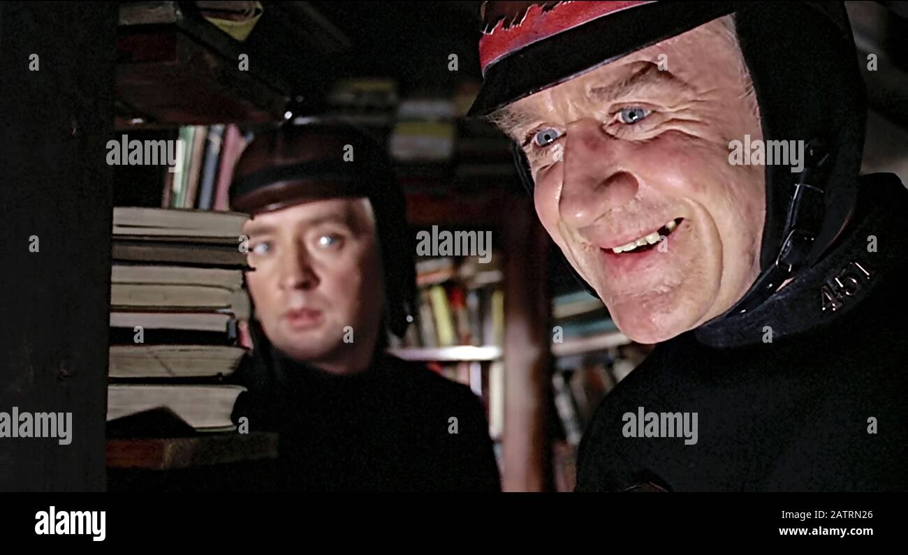 Fahrenheit 451 (1966) directed by François Truffaut and starring Oskar Werner as Guy Montag and Cyril Cusack as Captain Beatty in Ray Bradbury’s dystopian world where books are outlawed and burnt by firemen. Stock Photo