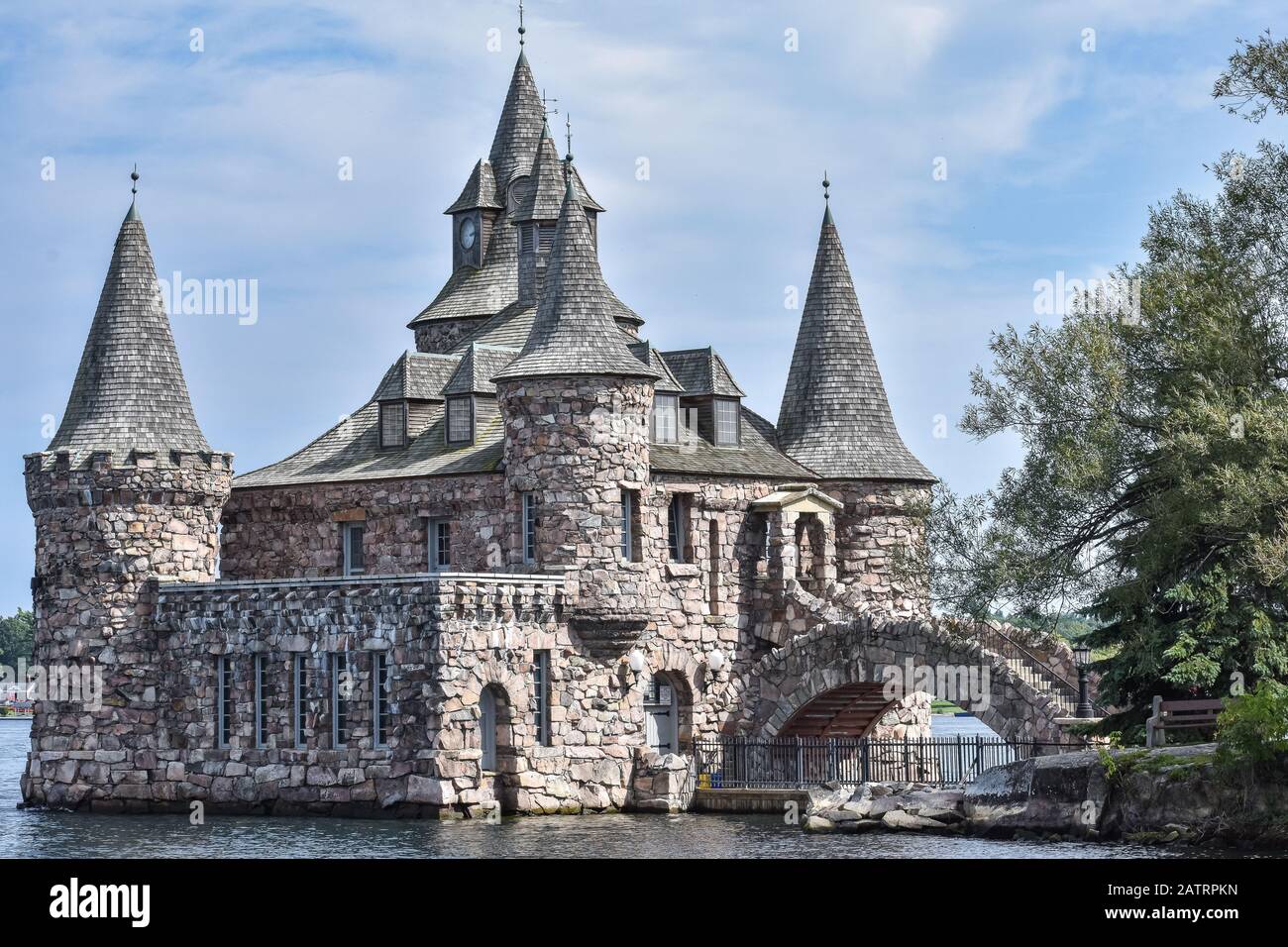 Detail of Boldt castle towers and bridge, in Heart Island. Located in the border between Canada and United States. During daytime in a blue sky. Thous Stock Photo