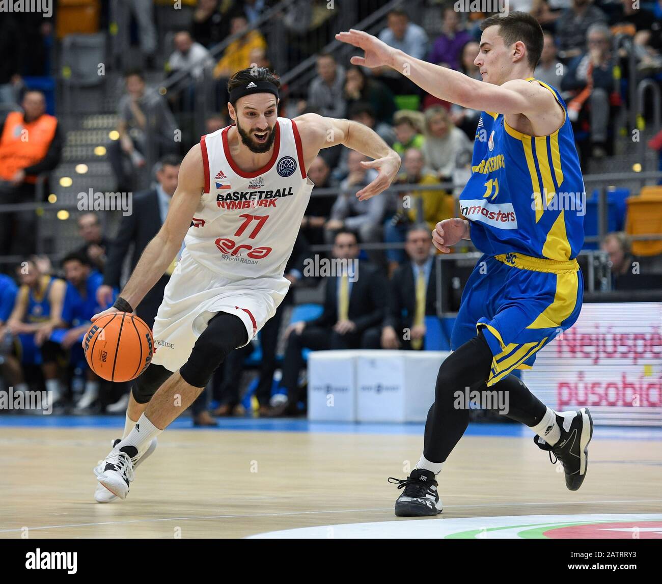 Prague, Czech Republic. 04th Feb, 2020. From left VOJTECH HRUBAN of Nymburk  and IOANNIS AGRAVANIS of Peristeri in action during the Men's basketball  Champions League 14th round match, Group C: Nymburk vs