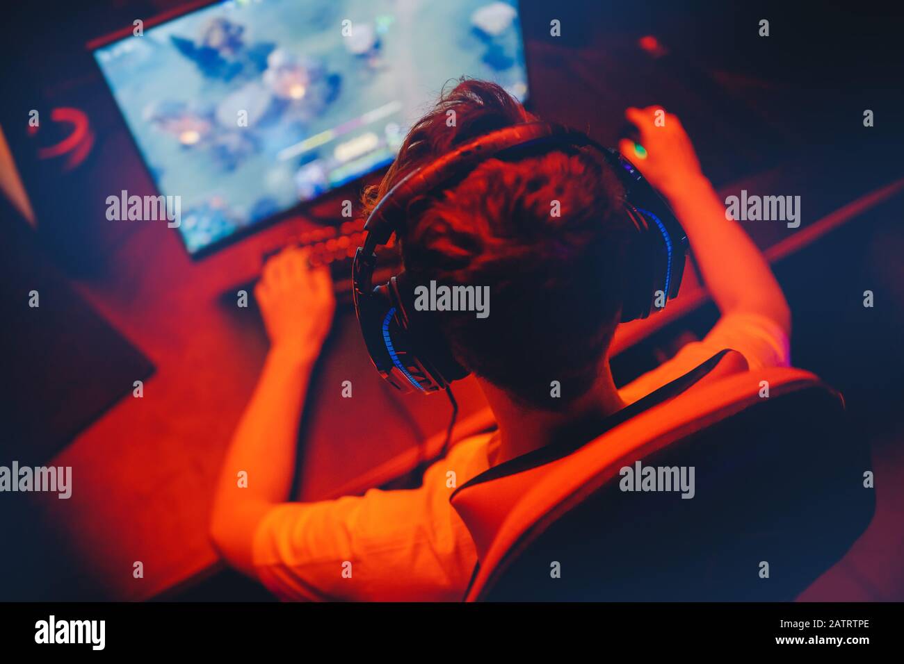 Professional video gamer playing online games tournaments pc computer