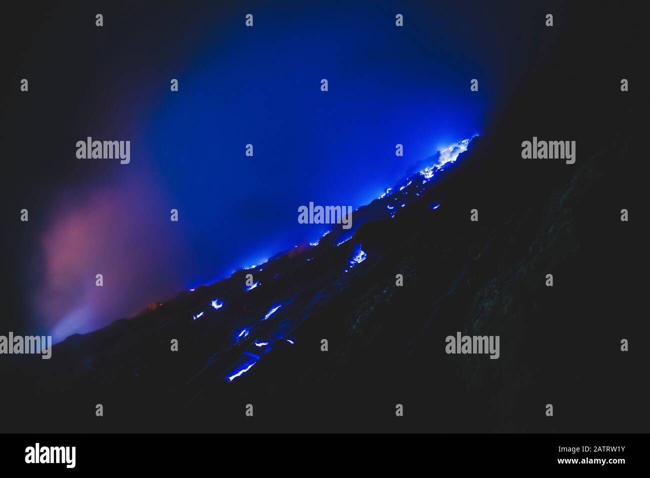 The blue flames of Ijen, inside the crater of the volcano; East Java, Java, Indonesia Stock Photo