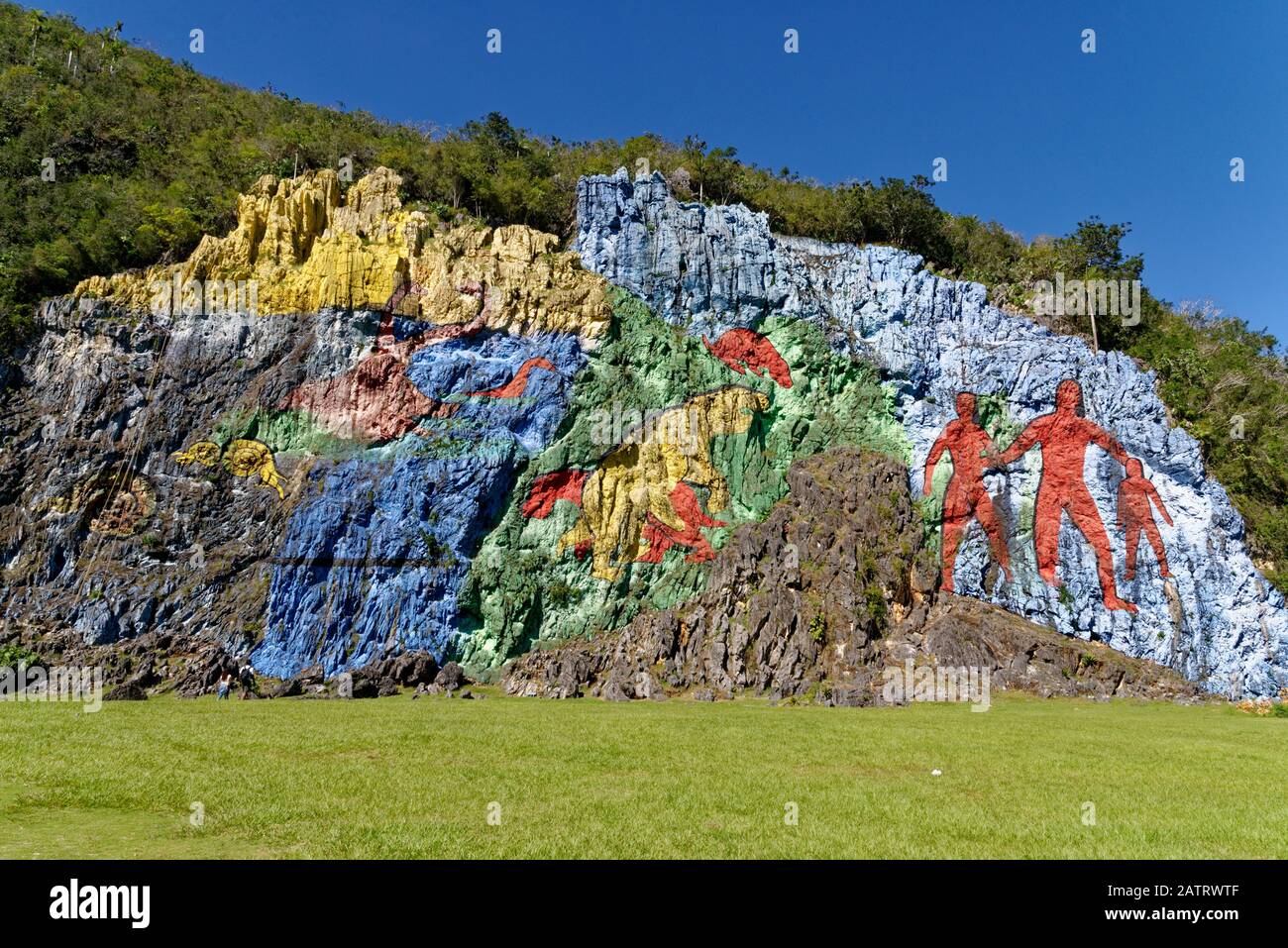 The Mural de la Prehistoria is a mural painted in 1961 by Leovigildo Gonzalez Morillo on a rocky side of the mountain Mogote Dos Hermanas Stock Photo