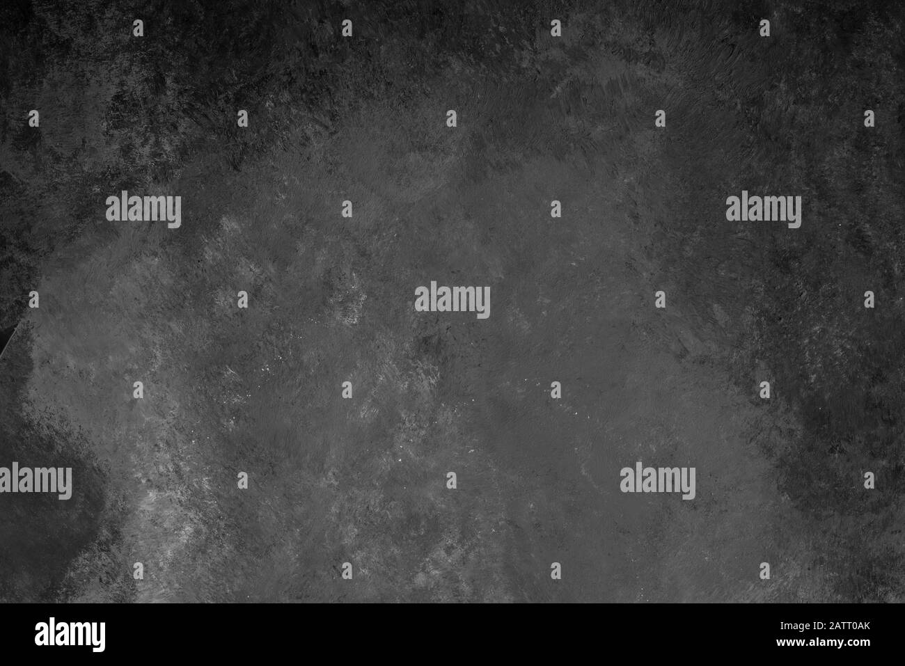 black and white painted textured wall as a background with copy space ...