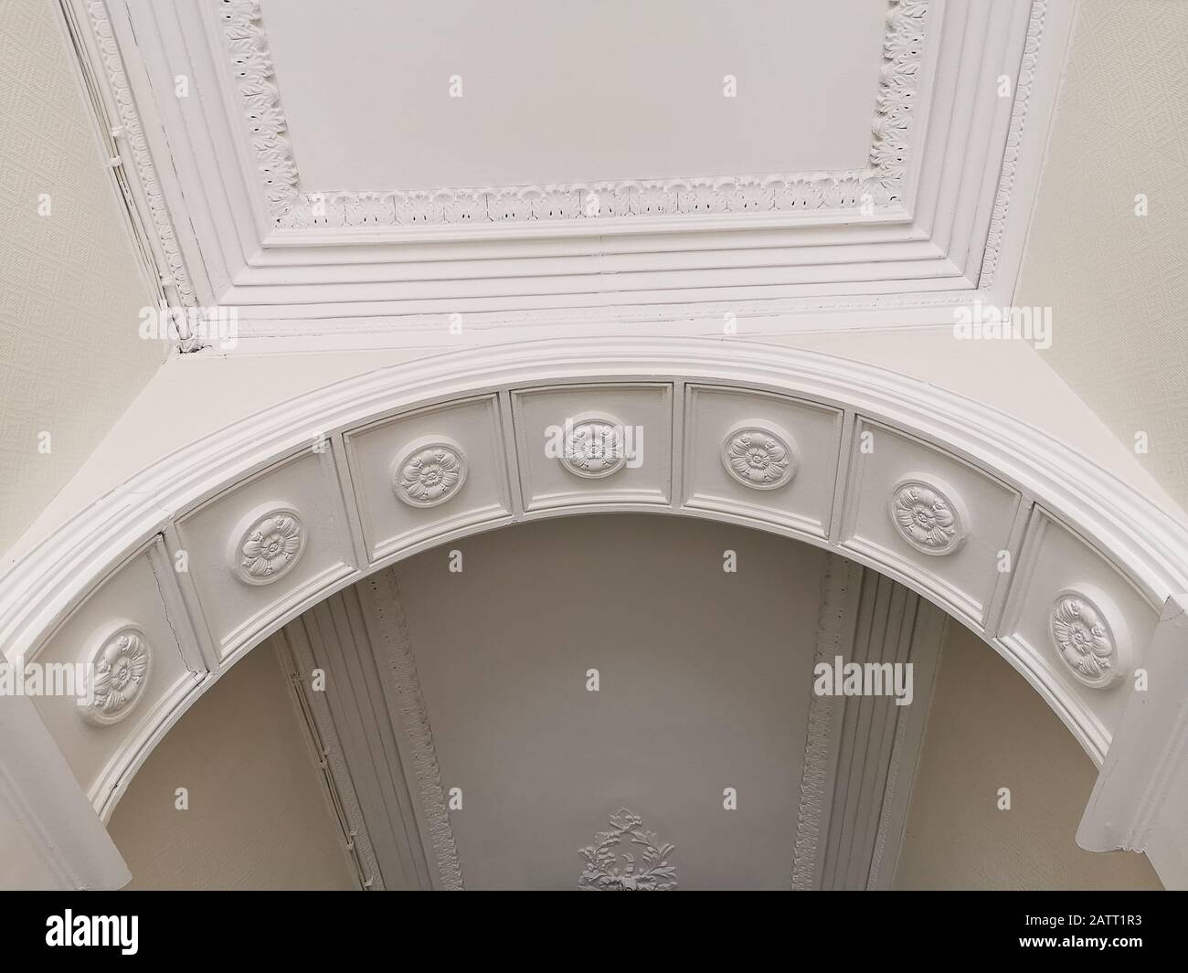 House Interior View Of Vault Ceiling Arch With Crown Moldings And