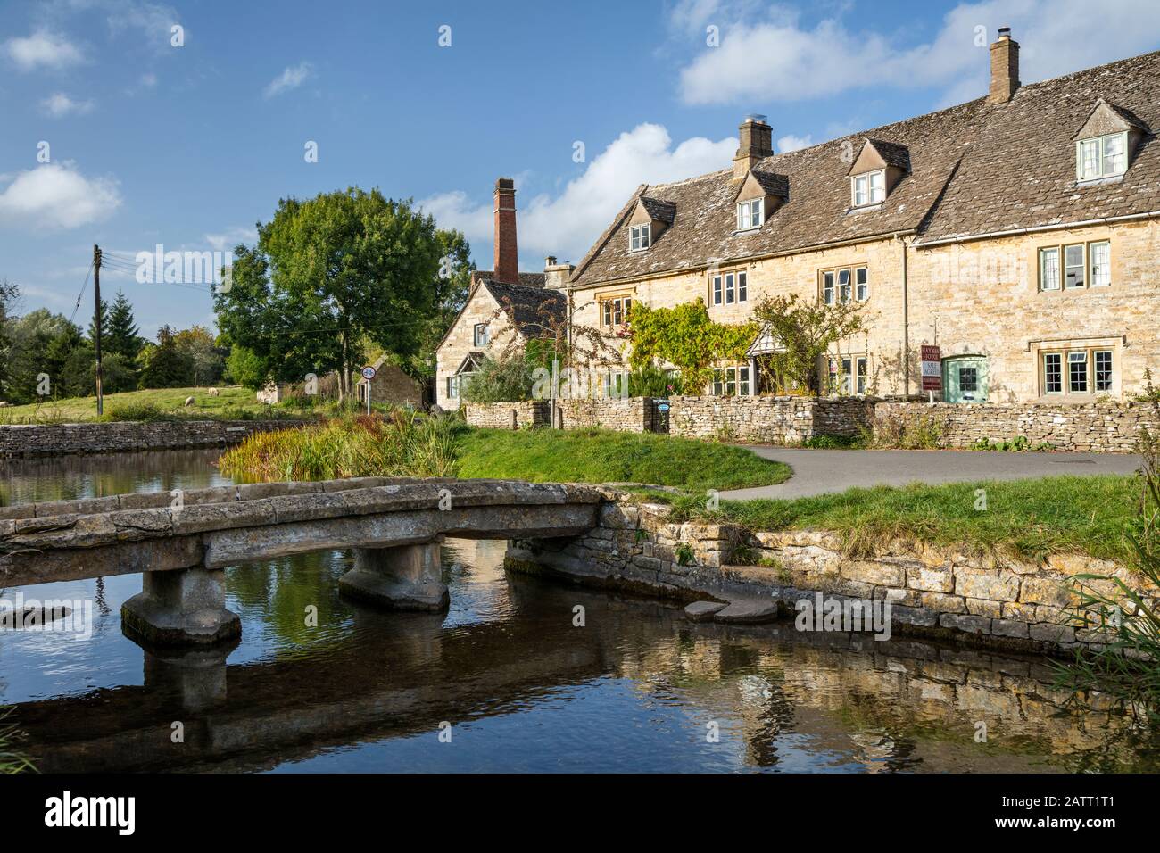 Connected cottage homes in Lower Slaughter, the Cotswolds, Gloucestershire, England, UK Stock Photo