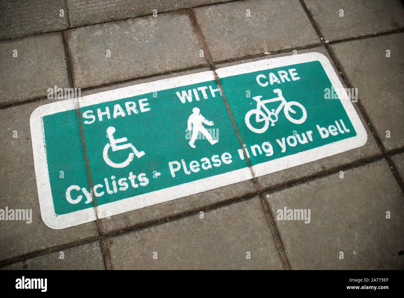 Share With Care Cyclists Please Ring Your Bell Sign On Pavement Portsmouth Hampshire England Stock Photo Alamy