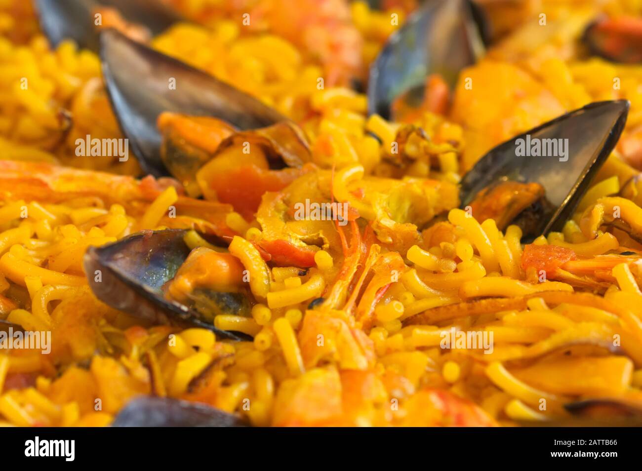 a spanish fideua, a typical noodles casserole with seafood Stock Photo -  Alamy