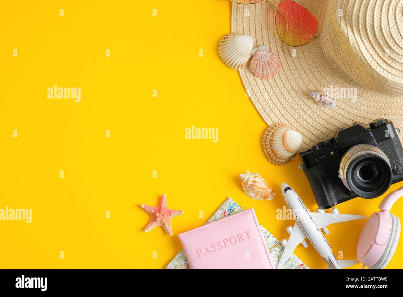 Traveler Desk With Summer Holiday Vacation Accessories On Yellow