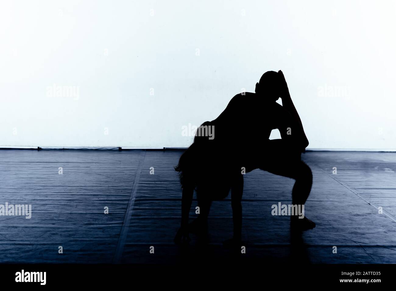 Ballet performed by a pair of dance artists wearing black tights Stock