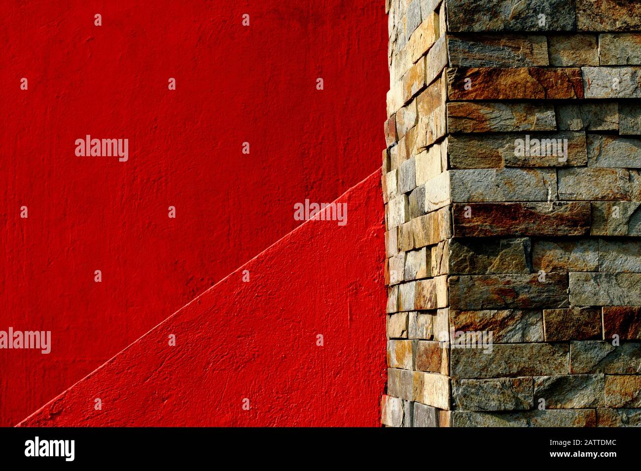Abstract Minimalist Architecture,red wall and stone bricks Stock Photo