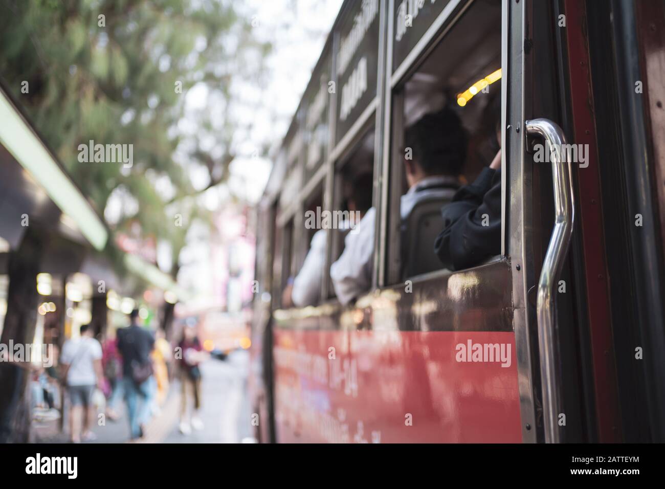 Open air public bus stops at the bus stop in Thailand Stock Photo
