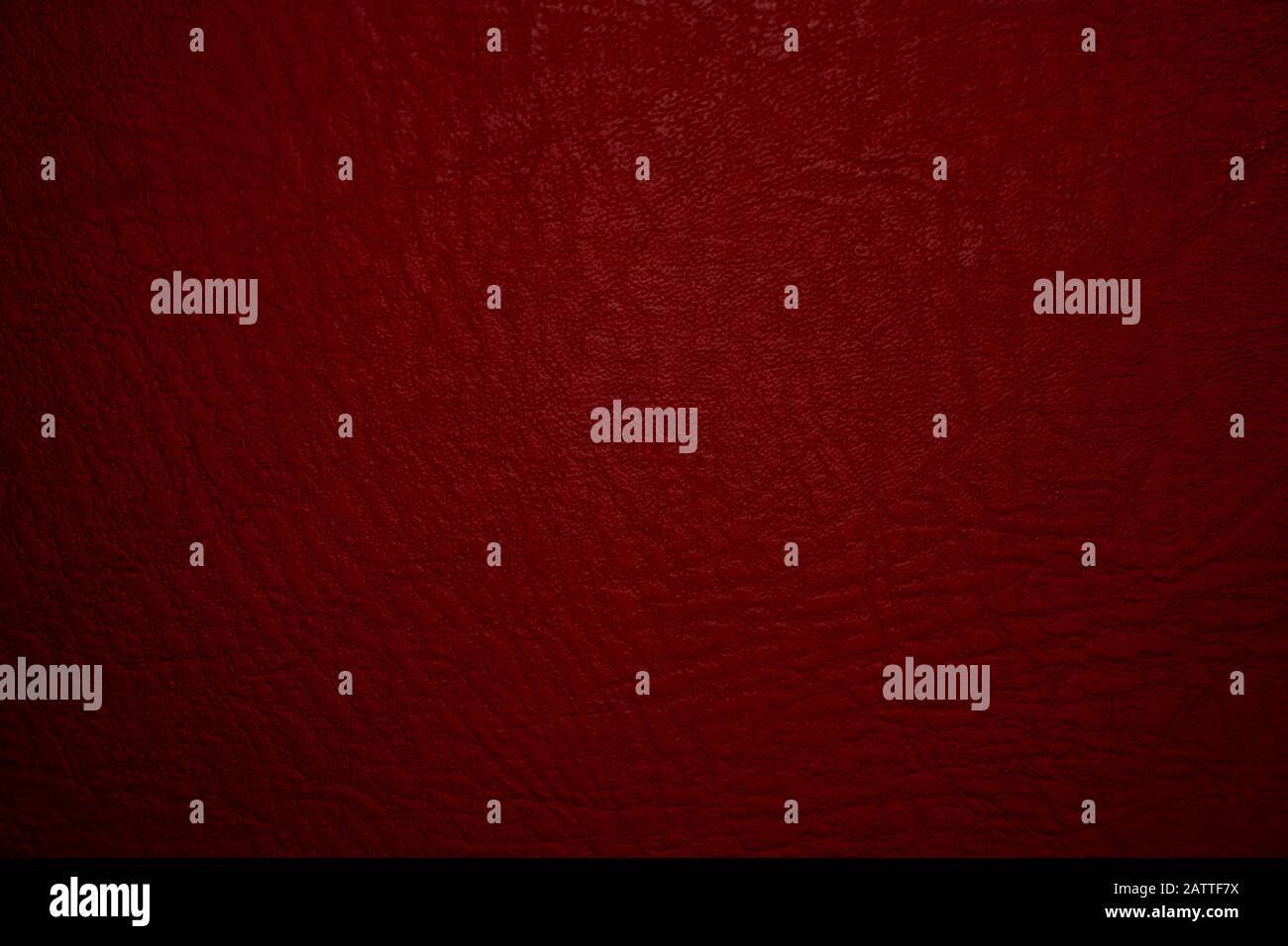 Dark red leather material texture, useful as background for design-works Stock Photo