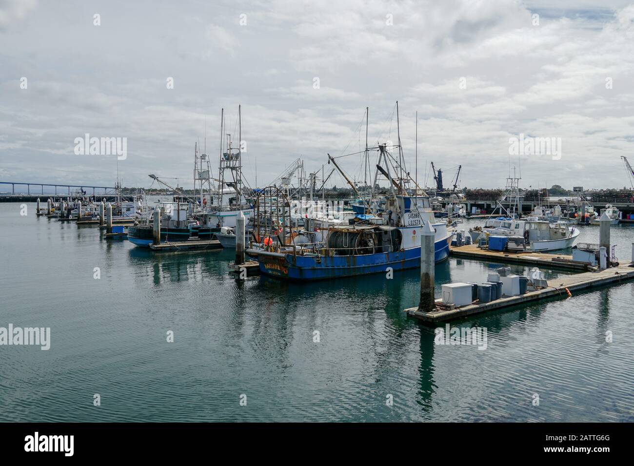 Commercial fishing boats docked in San Diego Harbor. Fish Harbor Pier Located in the downtown