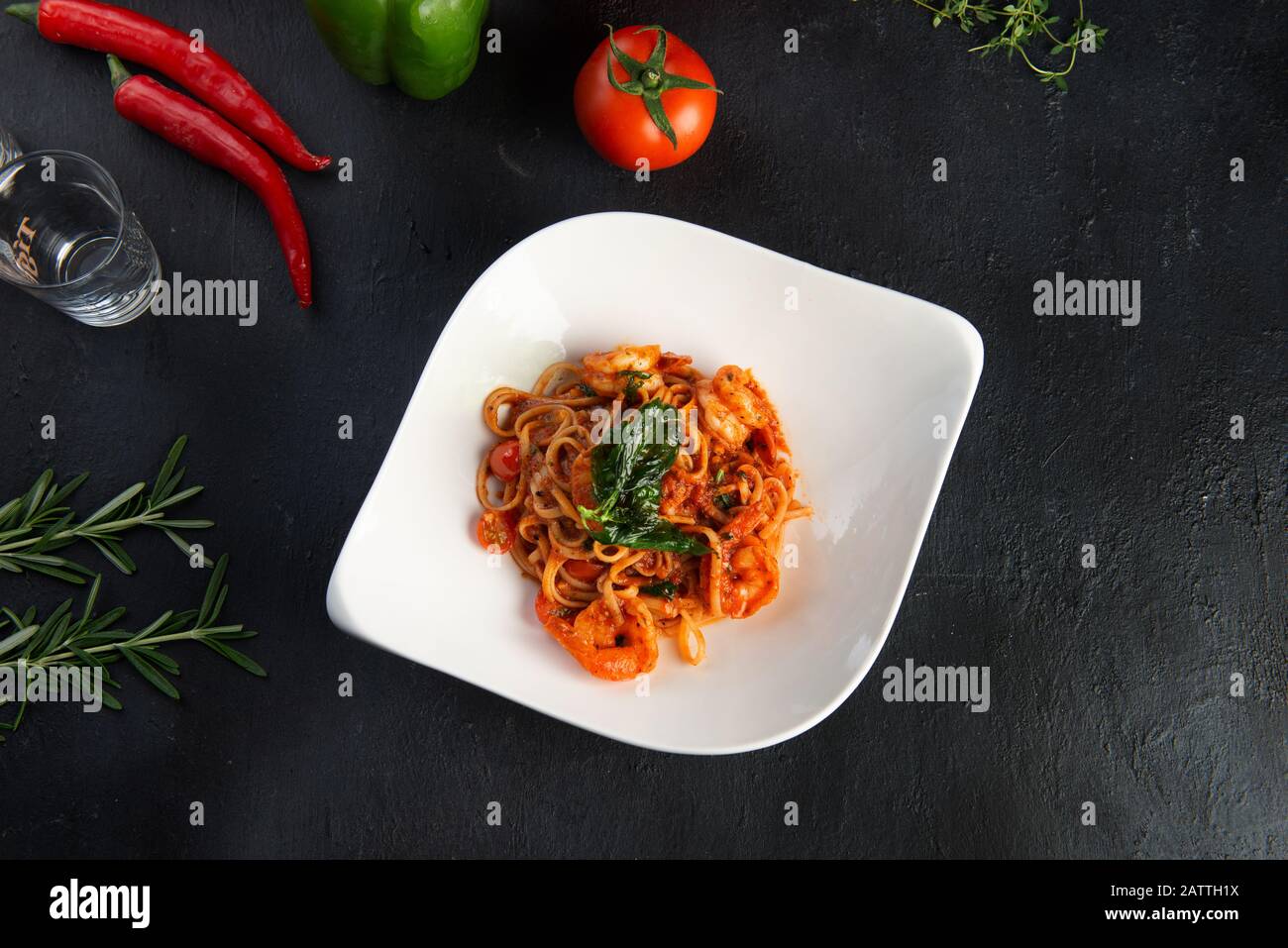 delicious spaghetti with shrimps, tomatoes, basil and cheese Stock Photo
