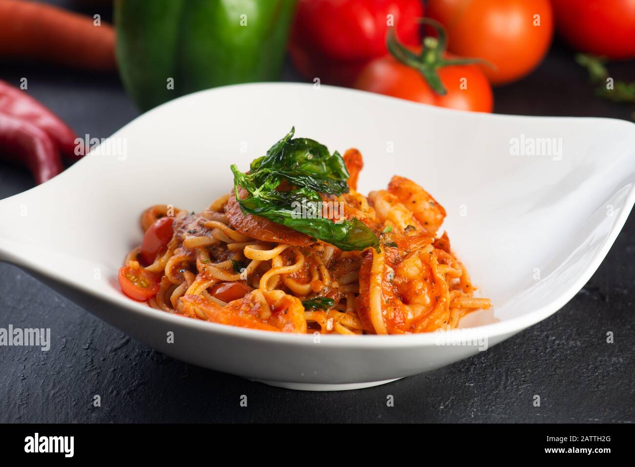 Pasta with meat, tomato sauce and vegetables Stock Photo