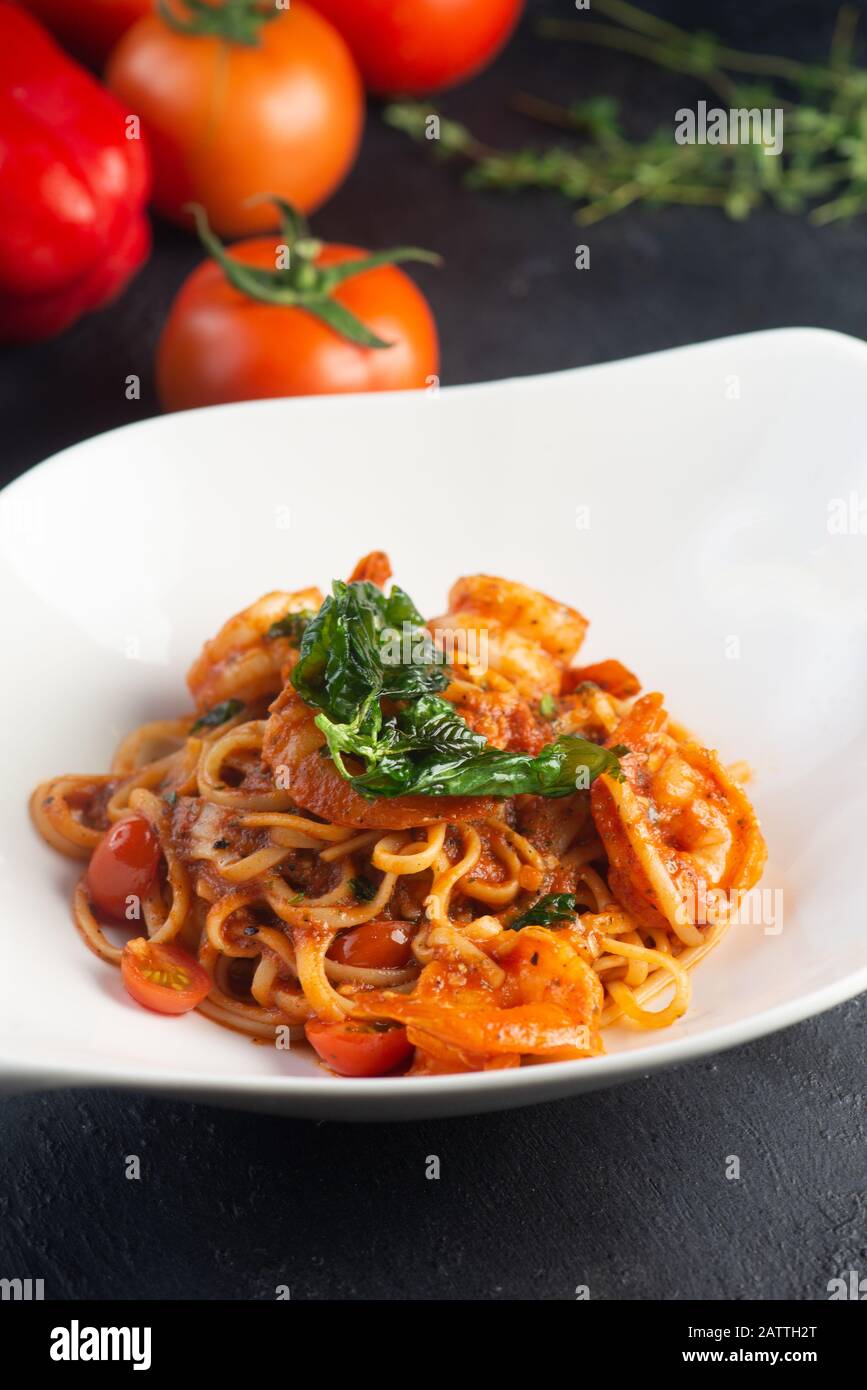 Pasta with meat, tomato sauce and vegetables Stock Photo